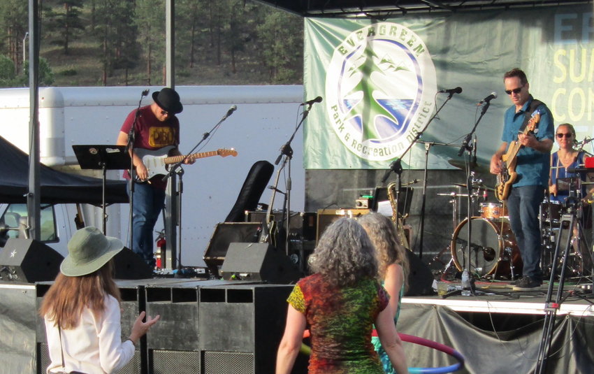 Dr. Poz, aka Paul Cohen, right, plays bass as his band, Dr. Poz & Friends headlines the first Evergreen Lake Concert Series.